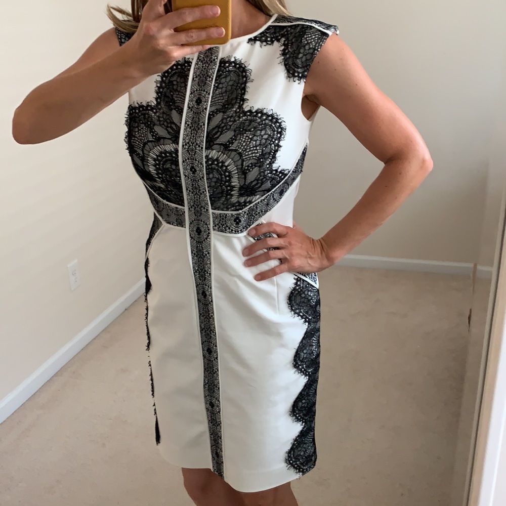 Striking White cocktail dress with black lace